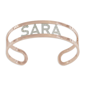 Bracciale aperto in argento rosè con lettere o simboli rodio