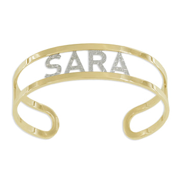 Bracciale aperto in argento dorato con lettere o simboli rodio